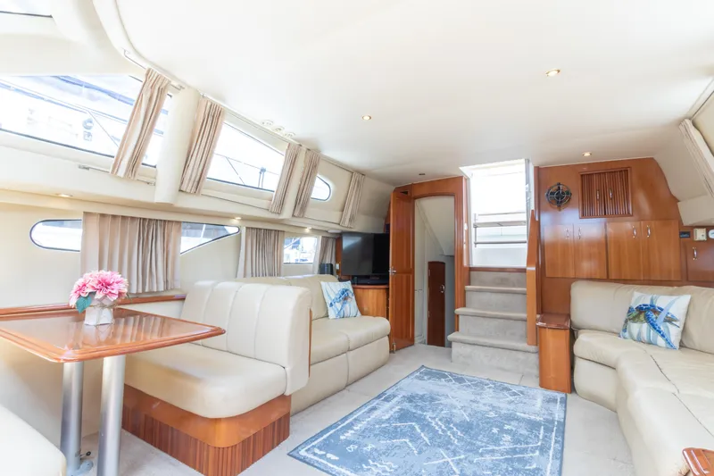  Yacht Photos Pics Luxurious interior of 2005 Carver 390 MY yacht with elegant seating and decor.