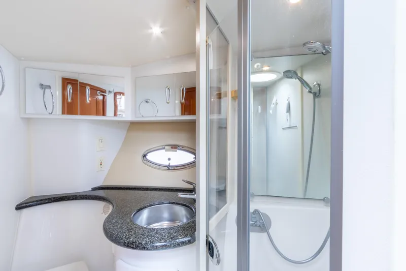  Yacht Photos Pics 2005 Carver 390 MY yacht bathroom with modern sink and enclosed shower.