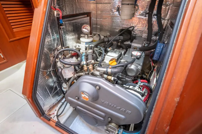 Resolute Yacht Photos Pics Engine compartment of a 2015 Blue Jacket 40 sailboat, featuring a Yanmar engine.