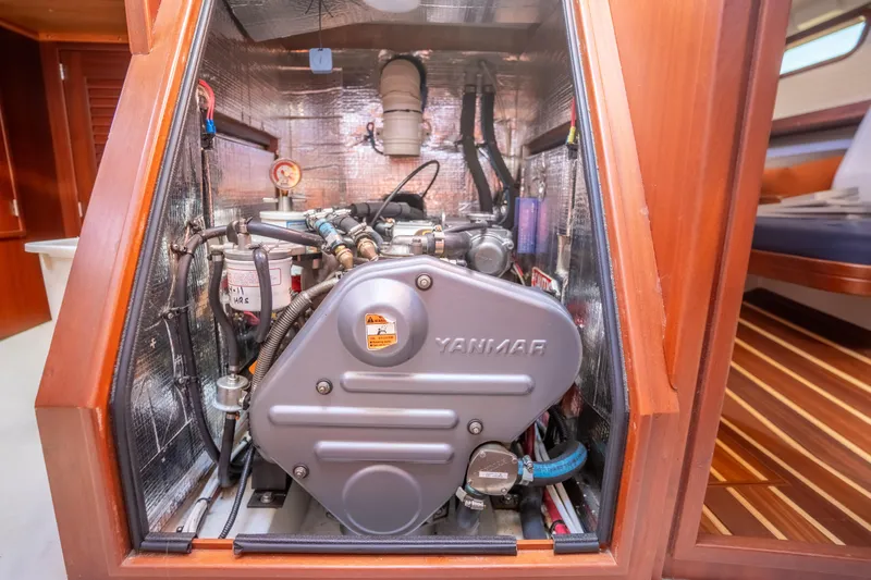 Resolute Yacht Photos Pics Engine compartment of a 2015 Blue Jacket 40 sailboat, featuring a Yanmar engine.