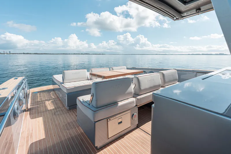 Live A Little Yacht Photos Pics Luxurious 2021 Pardo Yachts 43 with elegant deck seating on calm waters.