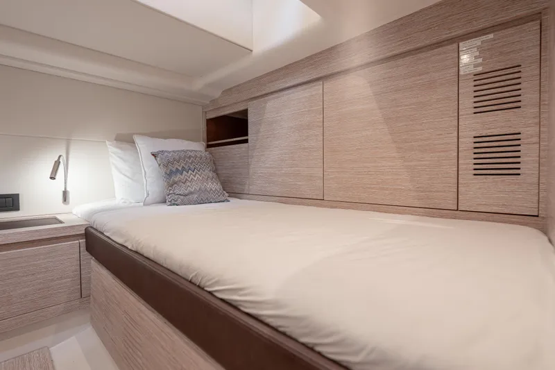 Live A Little Yacht Photos Pics Interior cabin of 2021 Pardo Yachts 43, featuring a cozy bed and modern design.