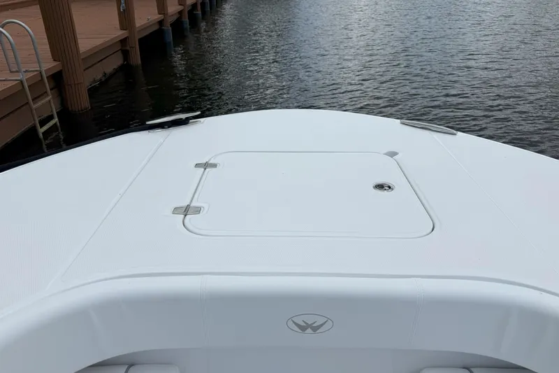  Yacht Photos Pics 2026 Southport 30 FE boat bow view at dockside, featuring sleek design.