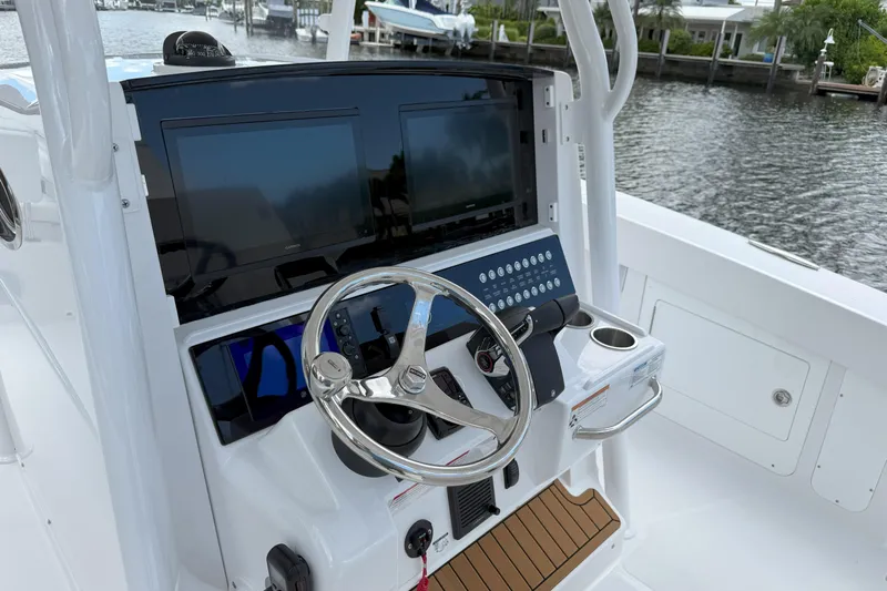  Yacht Photos Pics 2026 Southport 30 FE boat helm with modern controls and dual screens.
