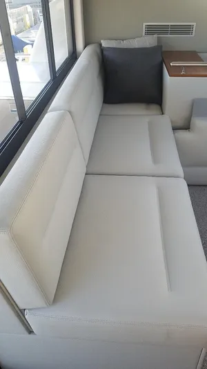  Yacht Photos Pics 2020 Maritimo M51 yacht interior with sleek gray seating and modern design.