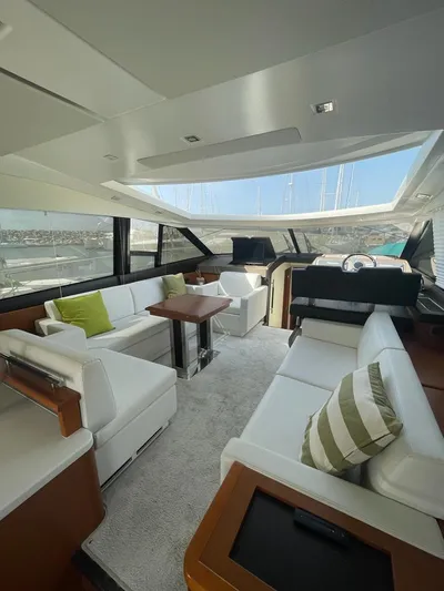  Yacht Photos Pics Luxurious interior of 2011 Prestige 500 S yacht with modern seating and panoramic windows.