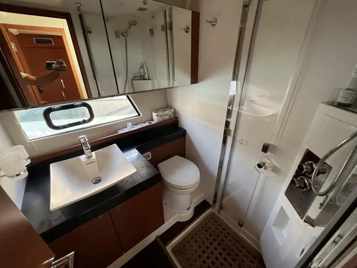  Yacht Photos Pics Bathroom interior of 2011 Prestige 500 S yacht with modern fixtures and shower.