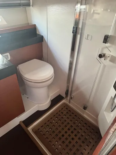  Yacht Photos Pics Bathroom interior of 2011 Prestige 500 S yacht with shower and toilet.