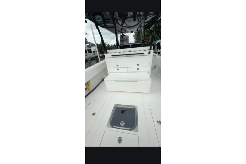  Yacht Photos Pics 2020 Contender 39 ST boat interior with storage compartments and seating.