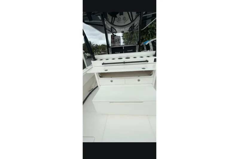  Yacht Photos Pics 2020 Contender 39 ST boat interior with storage compartments and fishing rod holders.