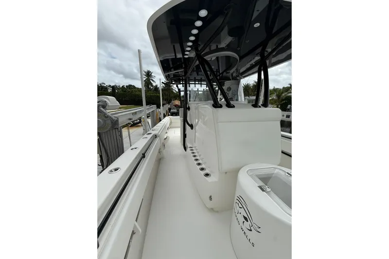  Yacht Photos Pics 2020 Contender 39 ST boat interior with seating and storage compartments.
