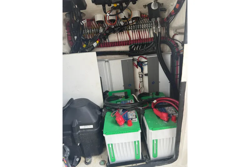  Yacht Photos Pics 2020 Contender 39 ST boat battery compartment with wiring and components.