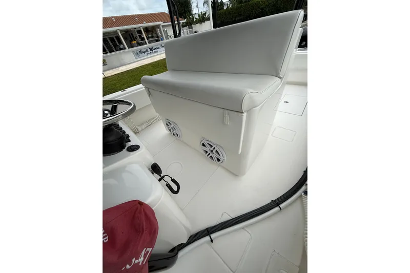  Yacht Photos Pics 2020 Contender 39 ST boat interior with cushioned seating and speakers.