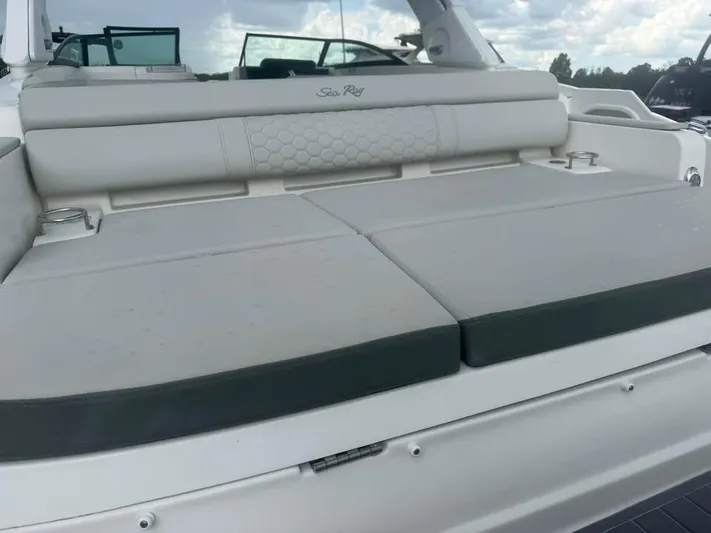  Yacht Photos Pics 2022 Sea Ray SDX 290 Outboard boat with spacious rear seating and cup holders.