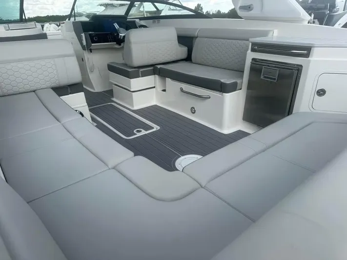  Yacht Photos Pics Luxurious interior of 2022 Sea Ray SDX 290 Outboard boat with spacious seating.