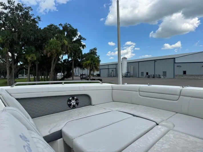  Yacht Photos Pics 2022 Sea Ray SDX 290 Outboard boat interior with white seating, outdoor setting.