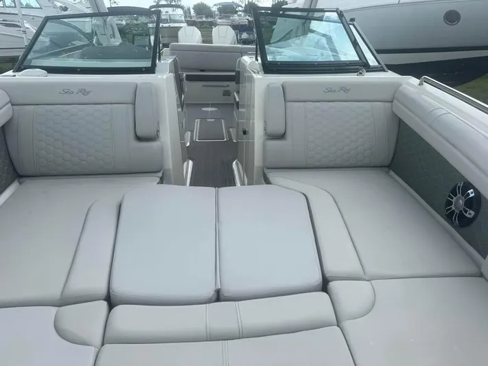 Yacht Photos Pics 2022 Sea Ray SDX 290 Outboard interior with luxurious seating and modern design.