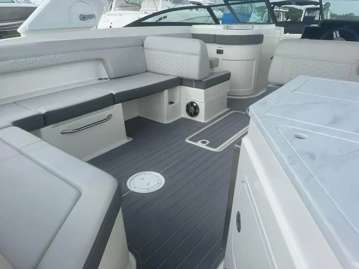  Yacht Photos Pics 2022 Sea Ray SDX 290 Outboard interior with spacious seating and modern design.