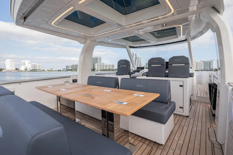 Improper Yacht Photos Pics Luxurious 2024 Fjord 41 XL yacht interior with sleek seating and modern design.