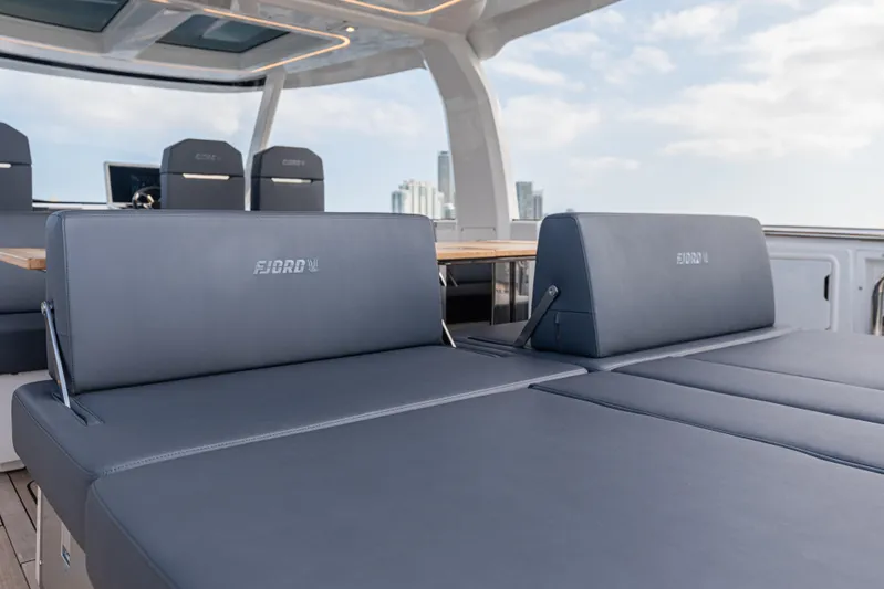 Improper Yacht Photos Pics 2024 Fjord 41 XL yacht interior with luxurious seating and modern design.