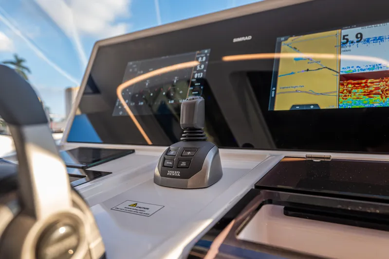 Improper Yacht Photos Pics 2024 Fjord 41 XL yacht dashboard with navigation controls and display screens.