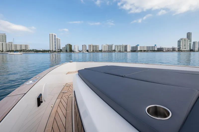 Improper Yacht Photos Pics 2024 Fjord 41 XL yacht deck with city skyline in the background.
