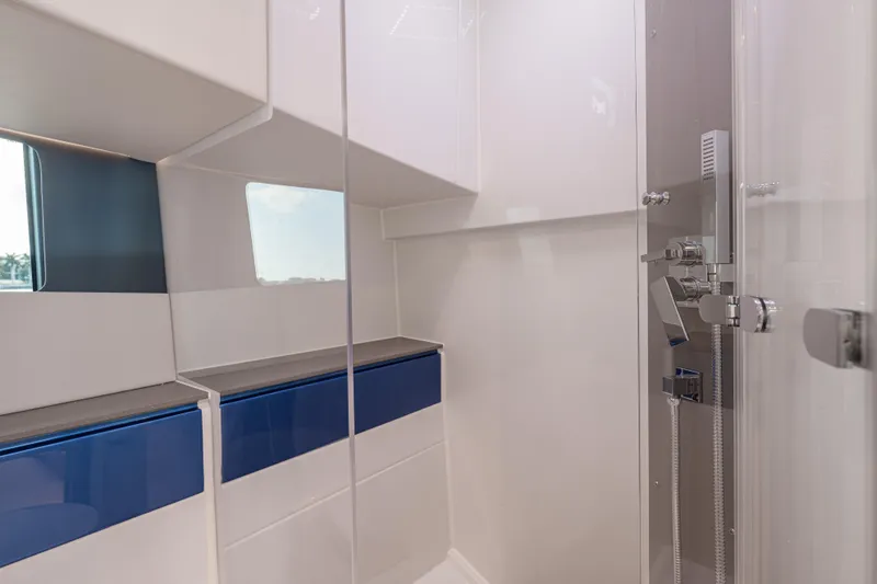 Improper Yacht Photos Pics Modern bathroom interior of 2024 Fjord 41 XL yacht, featuring sleek design and fixtures.