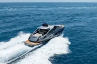 2024 Pershing 7X yacht cruising on open sea, showcasing sleek design and powerful performance.