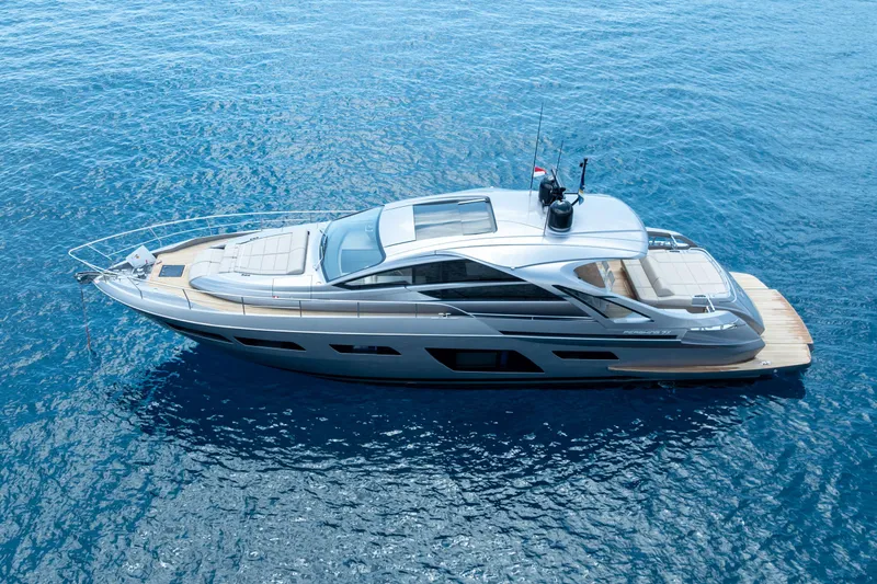 Ciao Yacht Photos Pics 2024 Pershing 7X yacht cruising on clear blue water.