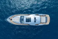 Top view of 2024 Pershing 7X yacht on blue ocean water.