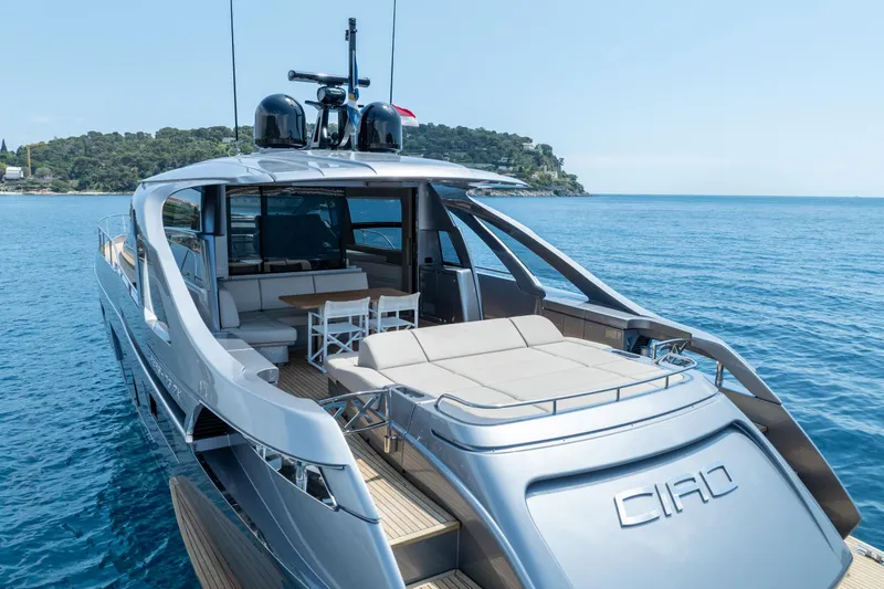 Ciao Yacht Photos Pics 2024 Pershing 7X luxury yacht on serene blue waters, featuring sleek design and spacious deck.