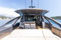 Luxurious 2024 Pershing 7X yacht interior with elegant seating and ocean view.