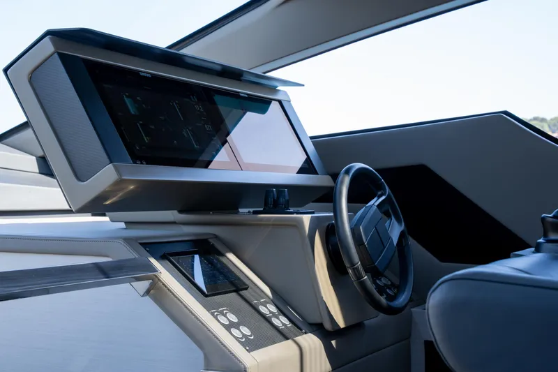 Ciao Yacht Photos Pics 2024 Pershing 7X yacht helm with modern dashboard and steering wheel.