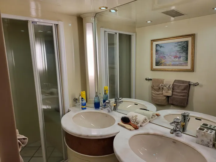  Yacht Photos Pics Luxurious bathroom in 2000 Horizon 74 Motor Yacht with dual sinks and shower.