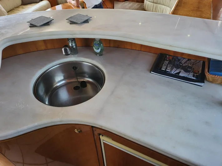  Yacht Photos Pics Luxurious yacht interior with marble countertop and sink, Horizon 74 Motor Yacht, 2000 model.
