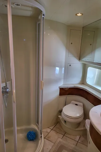  Yacht Photos Pics Bathroom interior of 2000 Horizon 74 Motor Yacht with shower and toilet.