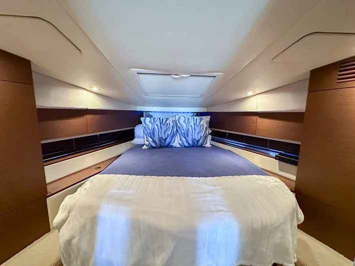 Wine Down Yacht Photos Pics Luxurious bedroom interior of 2012 Sea Ray 450 Sundancer yacht.