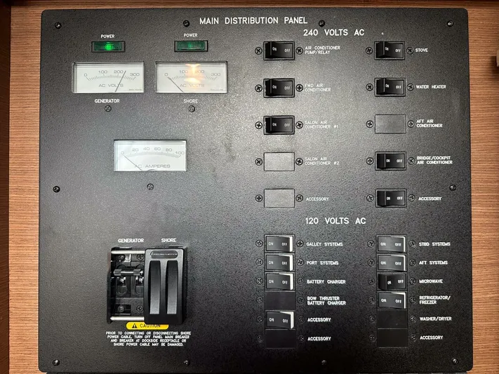 Wine Down Yacht Photos Pics Main distribution panel of 2012 Sea Ray 450 Sundancer boat, showing power controls and switches.