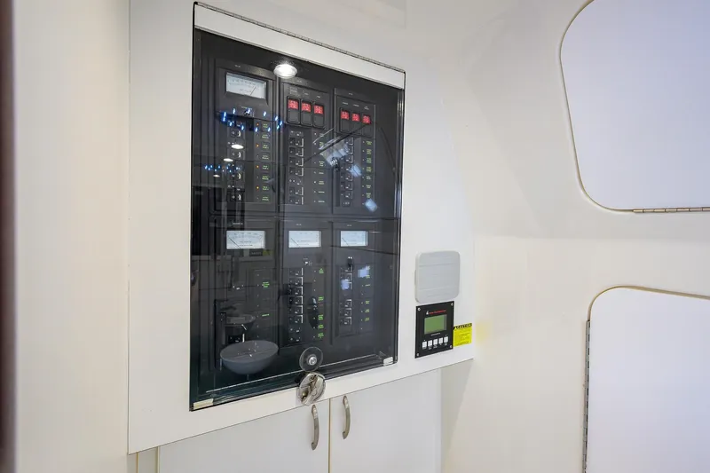 Tales N' Ales Yacht Photos Pics Electrical panel inside 2018 Buddy Davis 42 Center Console boat, Electrical Panel