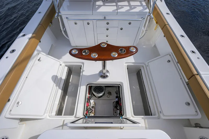 Tales N' Ales Yacht Photos Pics 2018 Buddy Davis 42 Center Console boat deck with storage compartments and rocket launcher