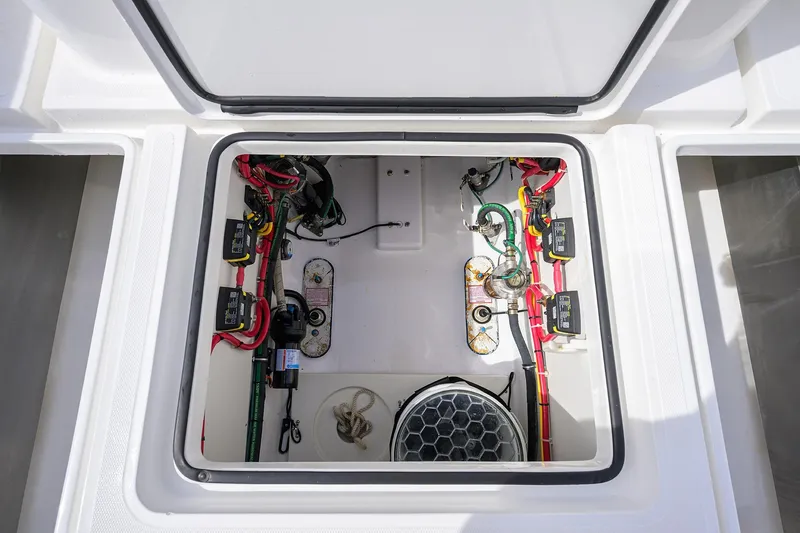 Tales N' Ales Yacht Photos Pics 2018 Buddy Davis 42 Center Console in deck electrical compartment