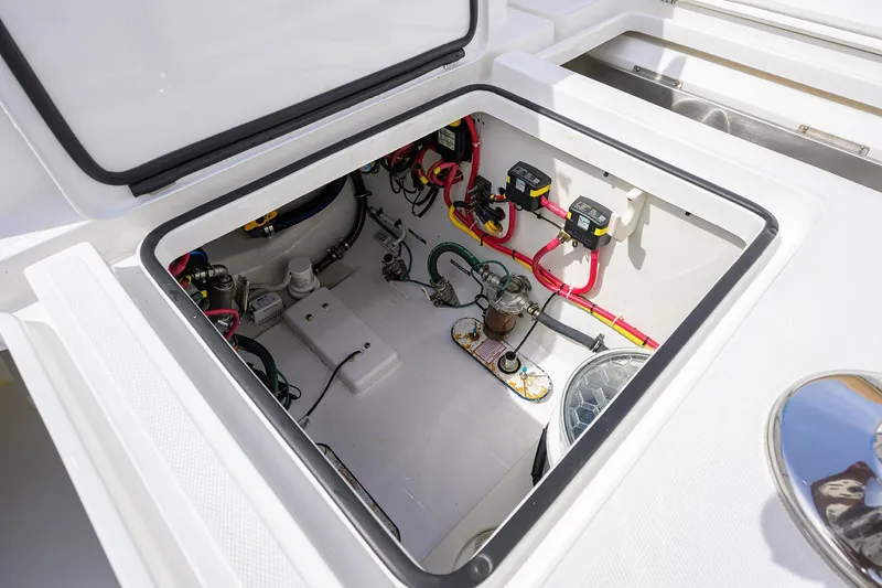 Tales N' Ales Yacht Photos Pics 2018 Buddy Davis 42 Center Console boat, electrical in deck compartment