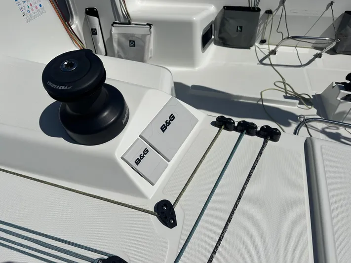 Rebel Yacht Photos Pics Jeanneau Sun Fast 3300 sailboat deck, featuring B&G equipment and winch, 2021 model.