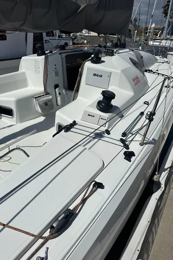 Rebel Yacht Photos Pics 2021 Jeanneau Sun Fast 3300 sailboat deck with rigging and winches.