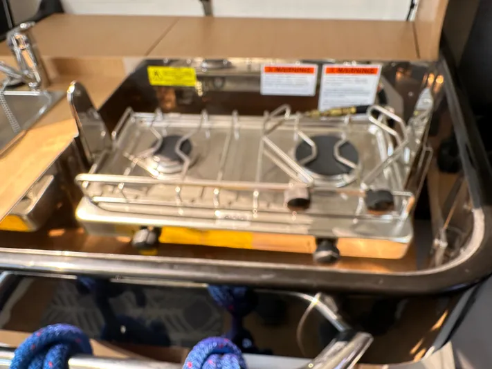 Rebel Yacht Photos Pics Two-burner stove in Jeanneau Sun Fast 3300 yacht, 2021 model.