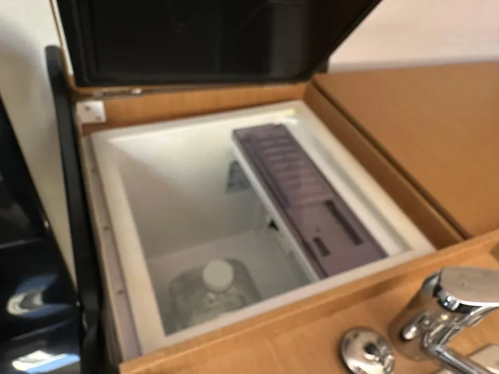 Rebel Yacht Photos Pics Built-in cooler on Jeanneau Sun Fast 3300 yacht, 2021 model.