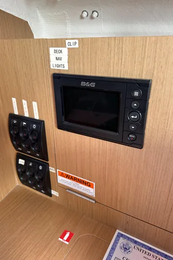 Rebel Yacht Photos Pics Control panel of 2021 Jeanneau Sun Fast 3300 sailboat with navigation system.