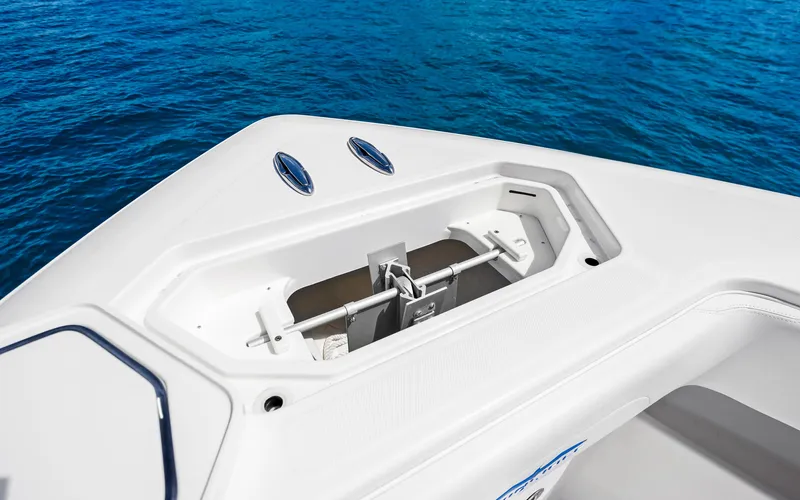  Yacht Photos Pics Invincible 39 boat anchor compartment, 2016 model, with ocean background.