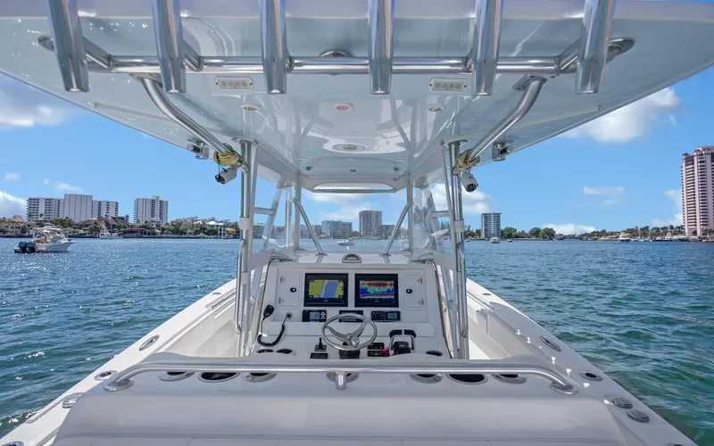  Yacht Photos Pics 2016 Invincible 39 boat dashboard with city skyline in the background.