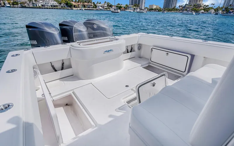  Yacht Photos Pics Invincible 39 boat interior with Yamaha engines, docked on a sunny day, 2016 model.